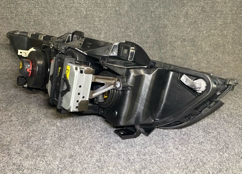 Hella Front RH Headlight Assy - H11410021 / 63128362552 - For BMW 540i & More